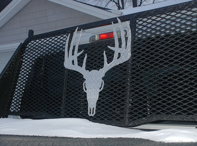 headace rack or ladder rack-offset-view-custom-size-diamond-plate-typical-buck-skull-black-headache-rack.jpg