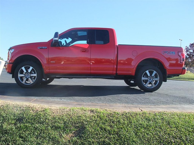 Who all has leveled trucks with stock wheels and tires-f150-010-large-.jpg