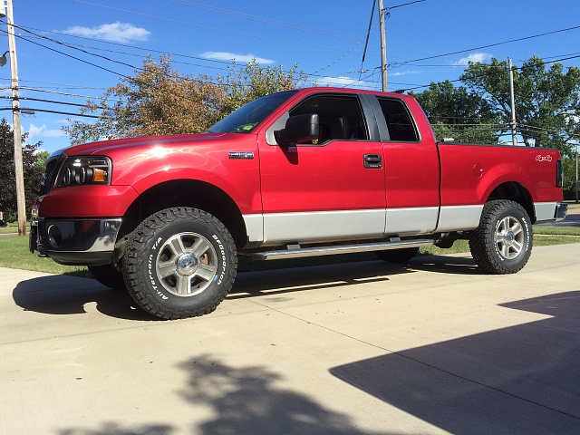 Show me your Leveled trucks with OEM rims!-img_3783.jpg