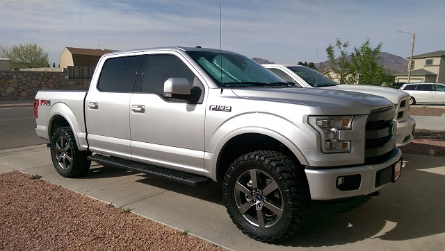 Show me your Leveled trucks with OEM rims!-imag1029.jpg