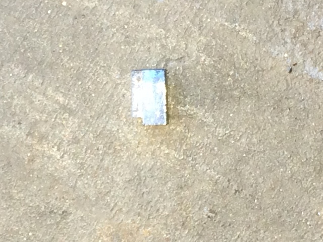Small aluminum pieces in driveway-img_3773.jpg