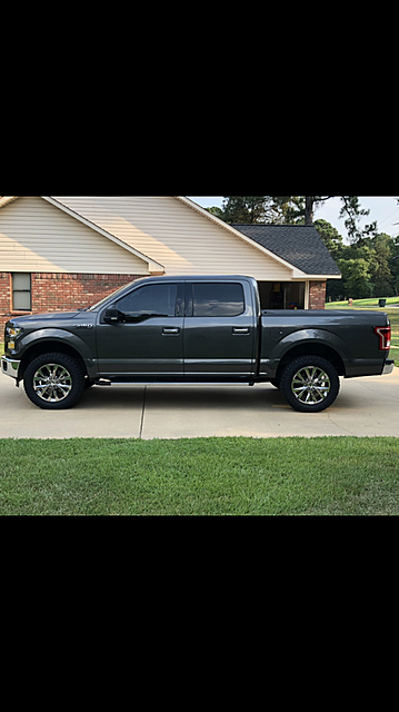 Show me your Leveled trucks with OEM rims!-photo196.jpg