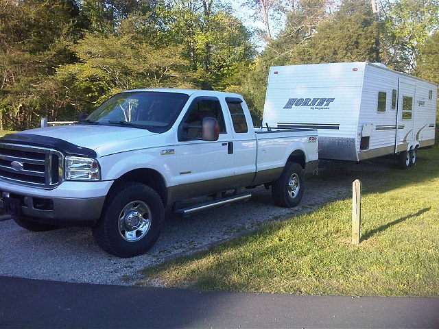 Lets see pics of those superduties!!-truck-camper.jpg