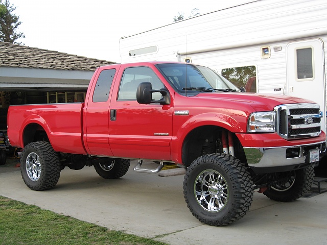 Lets see pics of those superduties!!-red-truck-37.jpg