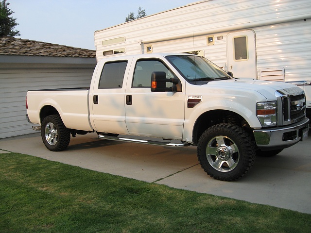 Lets see pics of those superduties!!-white-truck102.jpg