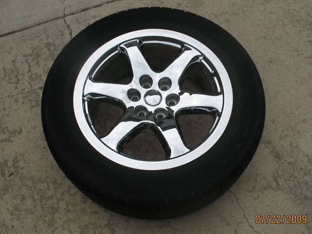 How much are these chrome Roush wheels/tires worth and should I sell?-img_7910.jpg