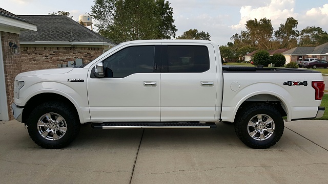 2.5&quot; Leveling Kit vs. 4&quot; Suspension Lift with factory 20's-my-truck-big-tires.jpg
