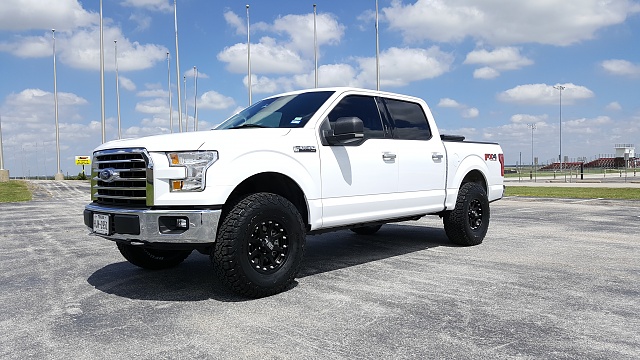 315/70/17's with Level-f150-9.jpg