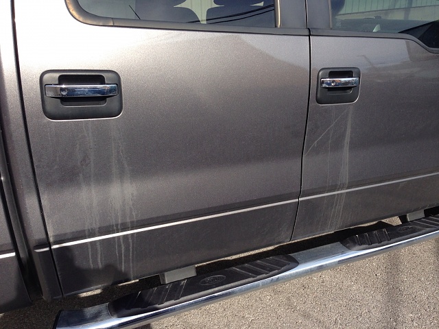 Dealer says grease leaking from door handles is normal.-image.jpg