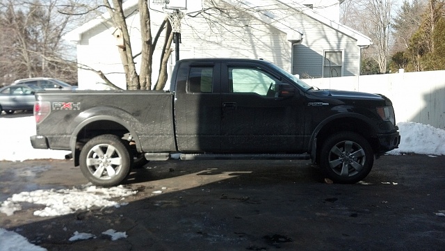 2 inch leveling kit with stock tires and wheels-truck-level-front-rear.jpg