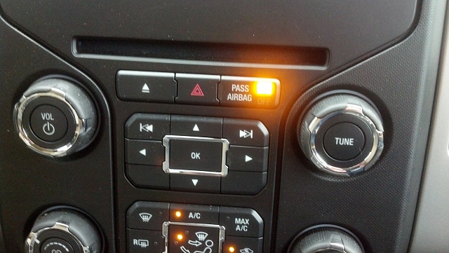 Passenger air bag light when sitting in seat, what gives?-airbagon.jpg
