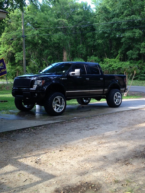 Lets see those 2009-2013 lifted trucks-image-1196260795.jpg