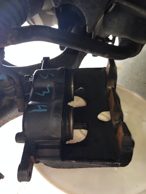 Front driver side brake hanging and dealer can't fix it-image-2946785174.jpg