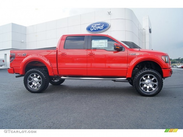 Red truck with aftermarket wheels?-69735159.jpg