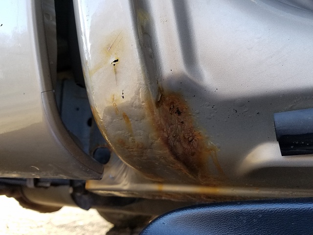 Rust Through- Not covered by warranty-2016-04-05-18.22.41.jpg