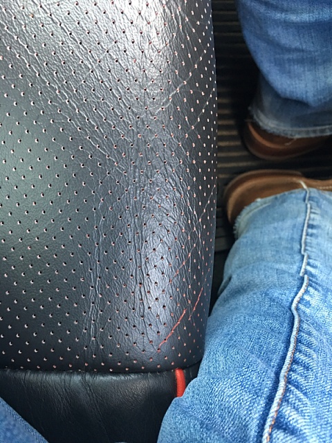 Perforated leather seat wear-image-1286445637.jpg