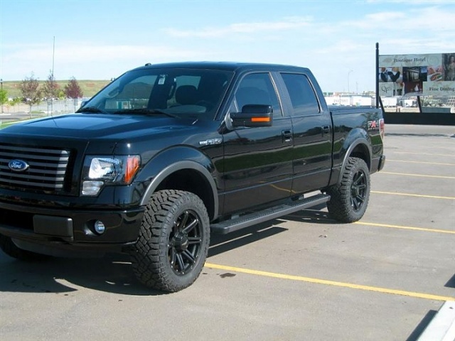 Let's see those Black F150's-truck-front-corner-medium-.jpg