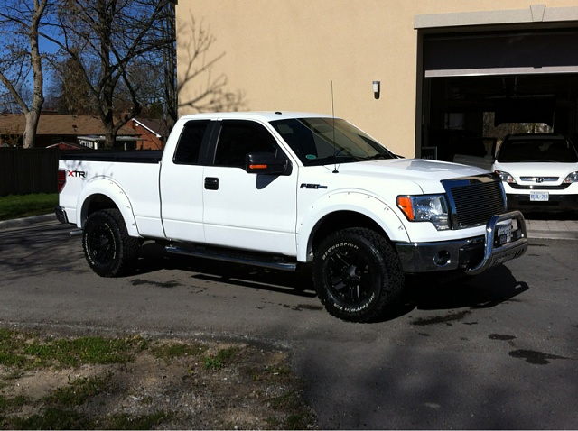 white truck, black wheels-image-2073044194.jpg