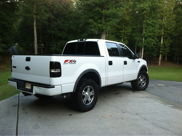 pic request: 35x12.50 tires on stock 18&quot; rims.-image-574867762.jpg