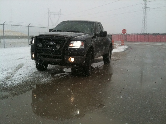 Hello, Im new here but not a new owner-truck-snow.jpg