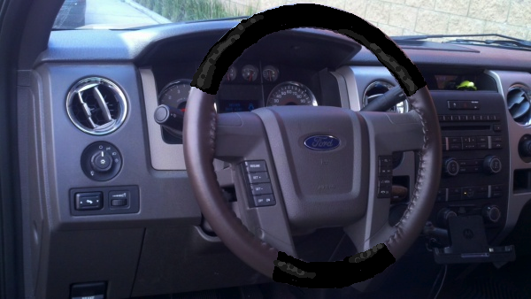 Has anyone Installed an Aftermarket Leather Steering Wheel Wrap?-steering-wheel-black-top-bottom.jpg
