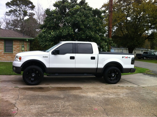 Blacked out trucks, any color post them up-image-4207821726.jpg