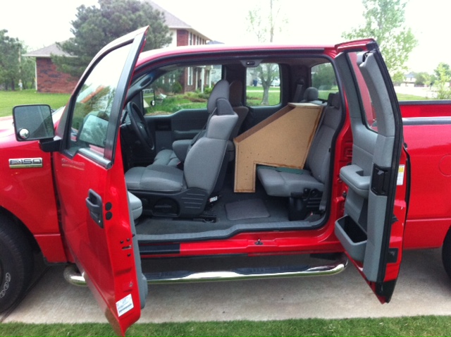 Custom enclosure under the back seats of my scab that houses speakers!-photo.jpg