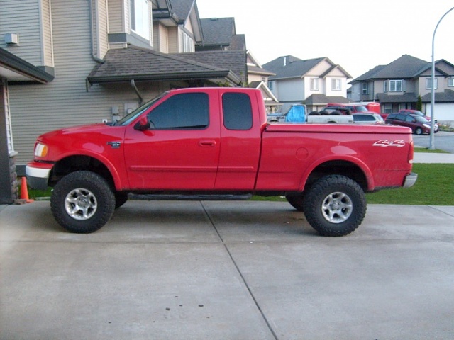 New to site..Need pics of trucks with body lift-2001-f150-xlt-4x4-005.jpg