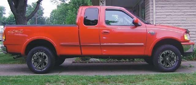 Pics of red 97-03 f150 with black wheels-monster.jpg