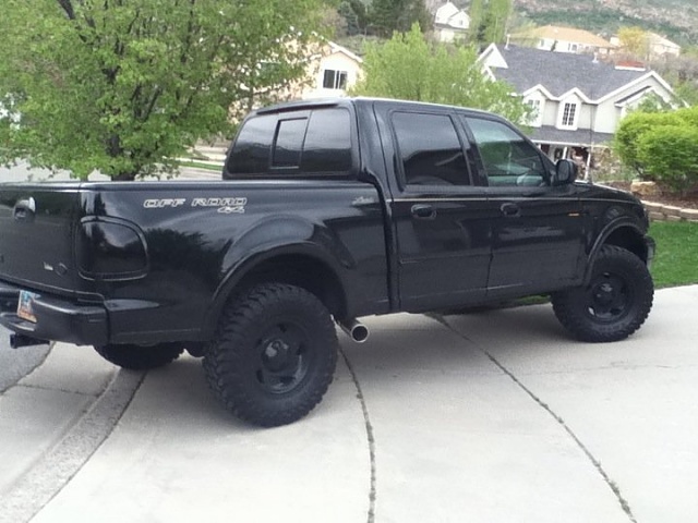 Murdered out/blacked out trucks... Post them-f150-2.jpg