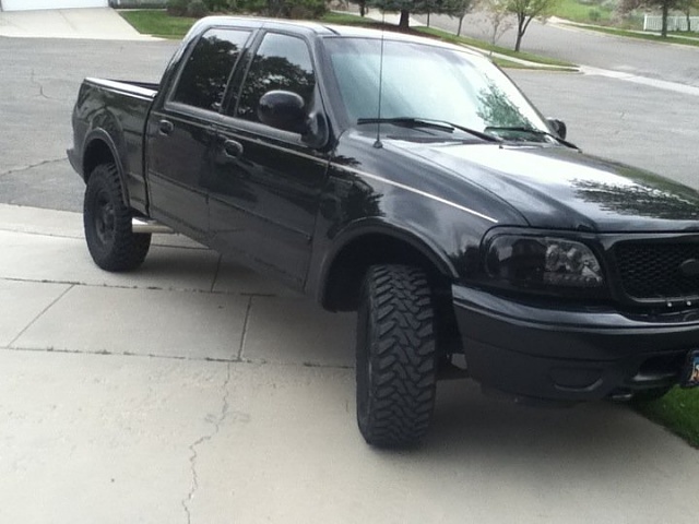 Murdered out/blacked out trucks... Post them-f150.jpg