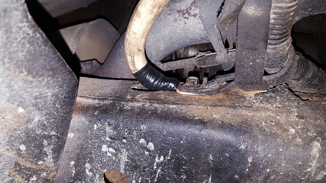 What is this stray wire/cable to the left of the engine?-20150826_214812.jpg