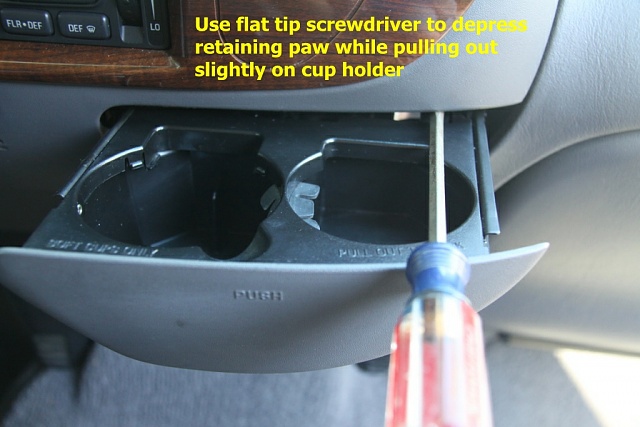 How to get your cup holder out if the return spring is broke-step-1.jpg