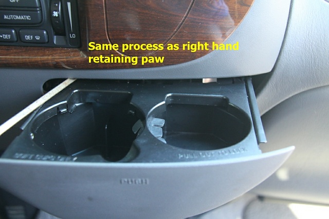 How to get your cup holder out if the return spring is broke-step-2.jpg