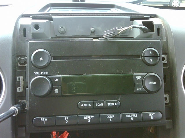 How to Remove Factory Radio for InDash Navigation on 2004 &amp; Up F150's-4-screws-remove-radio.jpg