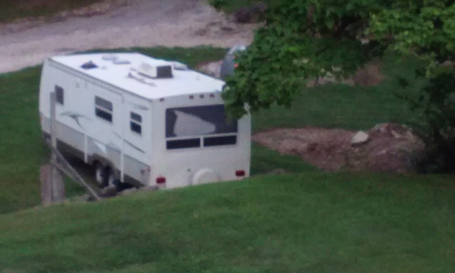 Lets see your campers being towed-camper-broken-window.jpeg